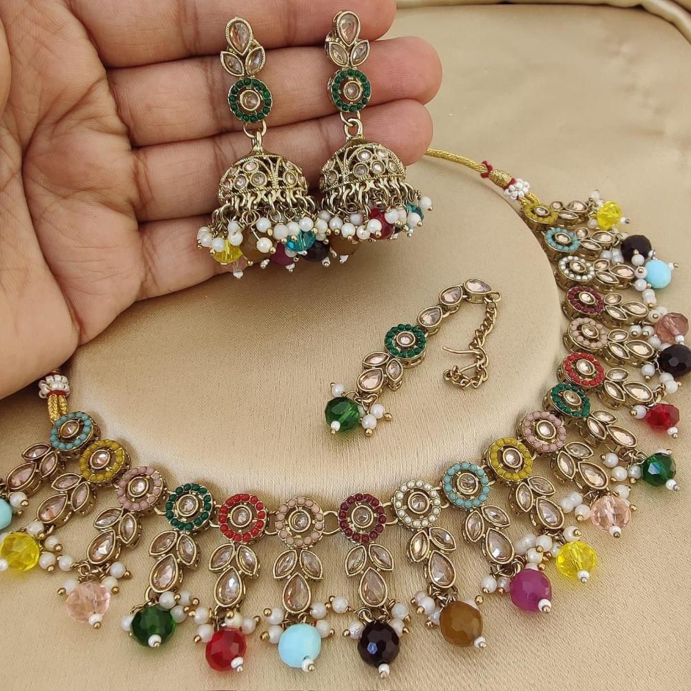 JewelMaze Gold Plated Crystal Stone And Pearls Necklace Set