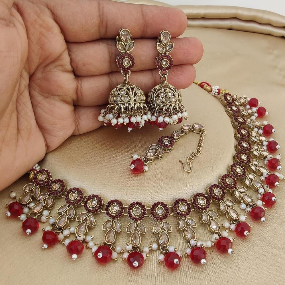 JewelMaze Gold Plated Crystal Stone And Pearls Necklace Set