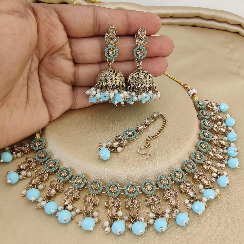 JewelMaze Gold Plated Crystal Stone And Pearls Necklace Set