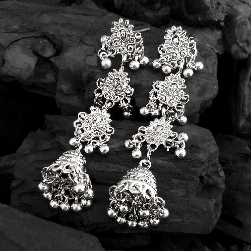 Step out in style with this beautiful oxidised silver plated earrings, which have been given a drop designer dangler perfectly designed. It will add bling to your look. This earring will go well with any of your ethnic outfits. • Material: Zinc Alloy • Type: Earrings • Sku Code: 1317048
